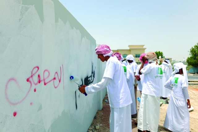 "جانب من مشاركة أفراد المجتمع في مبادرة عاصمتي"