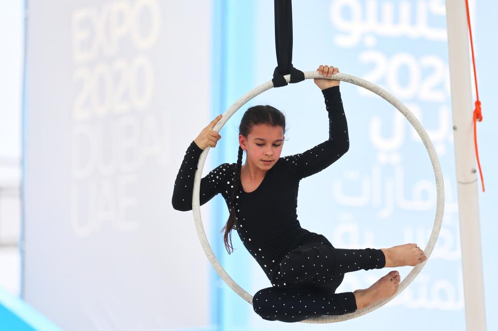 "DUBAI, 09 March 2022. Maiya Anoshko from Belarus performs during the World Aerial Gymnastics Championship 2022 (Day 1) at Expo Sports Arena, Expo 2020 Dubai. (Photo by David Gray/Expo 2020 Dubai)"