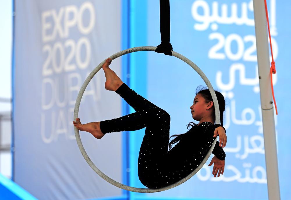 "DUBAI, 09 March 2022. Maiya Anoshko from Belarus performs during the World Aerial Gymnastics Championship 2022 (Day 1) at Expo Sports Arena, Expo 2020 Dubai. (Photo by David Gray/Expo 2020 Dubai)"