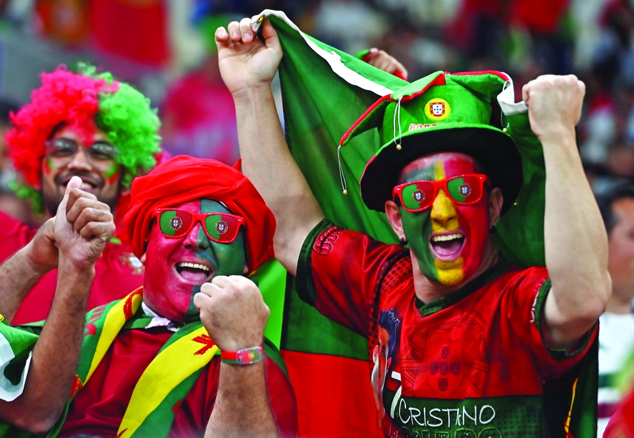 "epa10334916 Fans of Portugal prior to the FIFA World Cup 2022 group H soccer match between Portugal and Uruguay at Lusail Stadium in Lusail, Qatar, 28 November 2022.  EPA/Noushad Thekkayil"