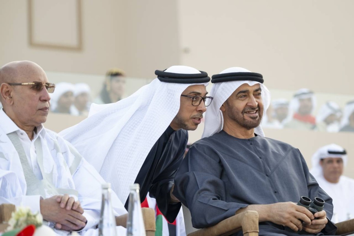 AL WATHBA, ABU DHABI, UNITED ARAB EMIRATES - December 07, 2024: HH Sheikh Mohamed bin Zayed Al Nahyan, President of the United Arab Emirates (R), speaks with HH Sheikh Mansour bin Zayed Al Nahyan, UAE Vice President and Deputy Prime Minister (2nd R), during the March of the Union, at the Sheikh Zayed Heritage Festival. Seen with HE Mohamed Ould Ghazouani, President of Mauritania (L).

( Mohamed Al Hammadi / UAE Presidential Court )
---