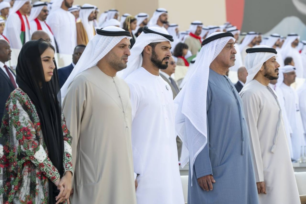 AL WATHBA, ABU DHABI, UNITED ARAB EMIRATES - December 07, 2024: (L-R) Sheikha Fatima bint Mohamed bin Hamad bin Tahnoon Al Nahyan, HE Sheikh Mohamed bin Hamad bin Tahnoon Al Nahyan, Advisor to the UAE President, HH Sheikh Zayed bin Hamdan bin Zayed Al Nahyan, HH Sheikh Dr Sultan bin Khalifa Al Nahyan, Advisor to the UAE President and HE Sheikh Sultan bin Tahnoon Al Nahyan, Chairman of the Board of the Frontline Heroes Office, stand for the UAE national anthem during the March of the Union, at the Sheikh Zayed Heritage Festival.

( Mohamed Al Hammadi / UAE Presidential Court )
---