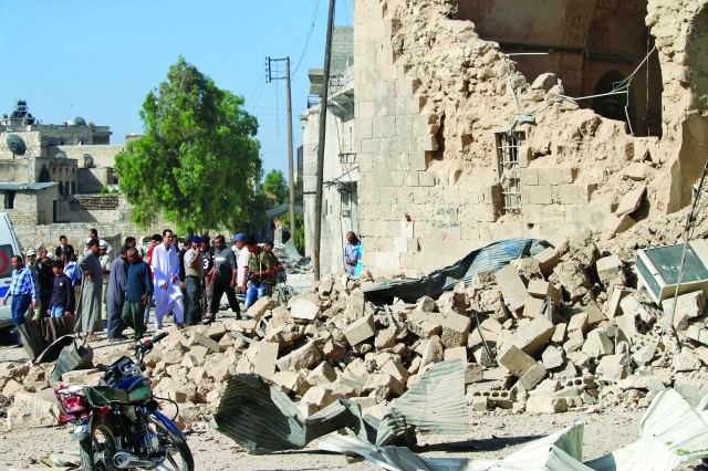 الصورة : قصف حلب بالصواريخ يبرز لغز العقلية البوتينية