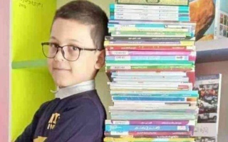 الصورة: الصورة: طفل جزائري يقرأ 276 كتاباً في وقت قصير