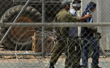 الصورة: الصورة: ارتفاع حصيلة المعتقلين الفلسطينيين في سجون إسرائيل إلى 9520 معتقلاً