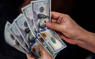 الصورة: الصورة: استقرار الدولار بعد تقرير التضخم الأمريكي